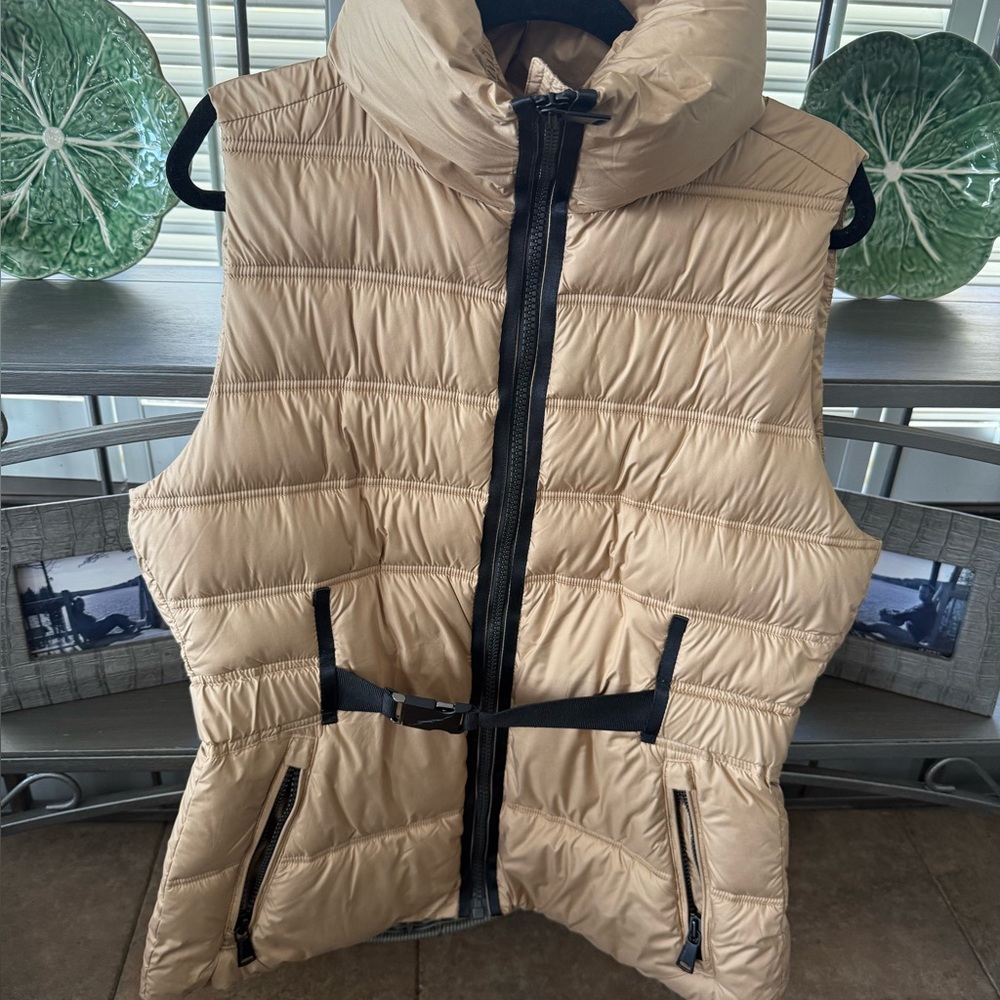 Tan Puffer Vest with Black Accents
Brand Alp N Rock bought at Sierra